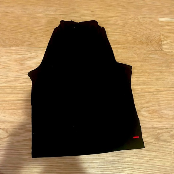 Black turtleneck buttons on the inside small circle on the back - Picture 1 of 4